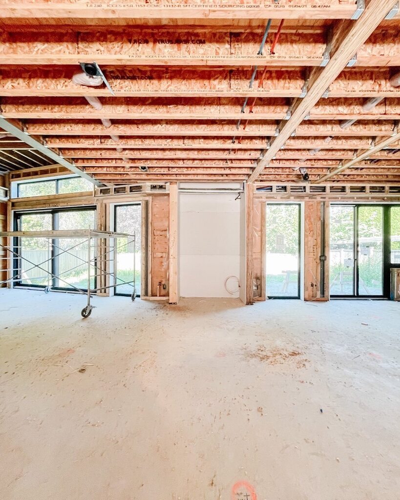 Ready for the fireplace which will anchor this beautiful modern homes open kitchen living and dining… on the right is a foldaway door / window that becomes a pass thru bar top table outside… on the left is an oversized sliding glass wall that opens o… instagr.am/p/CgiTz7rJKb4/