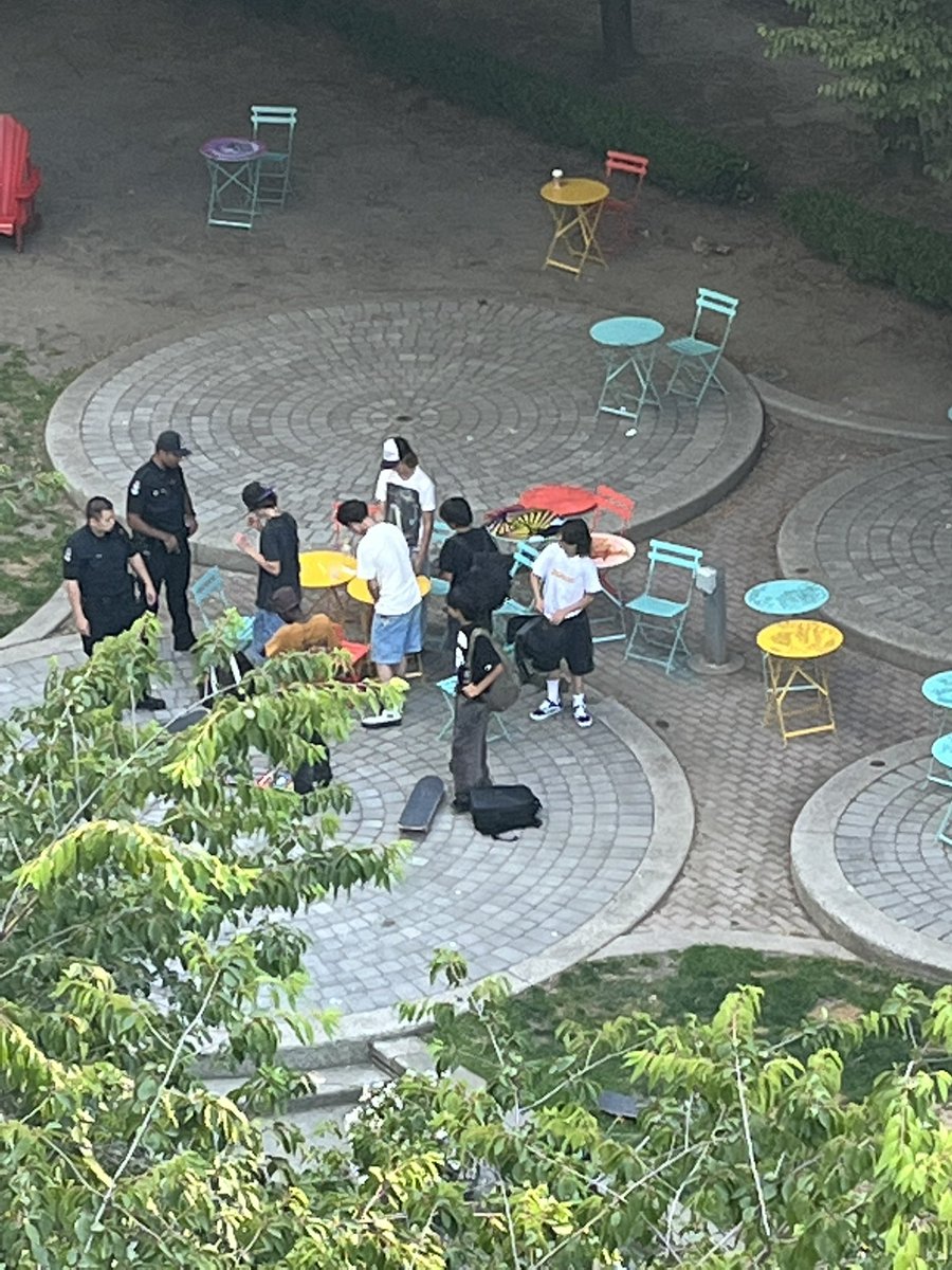 electricyvr's tweet photo. @downtownvan these kids were graffitiing the #lot19 plaza tables. @VancouverPD attended but only made them clean two tables https://t.co/10xreDeDcx