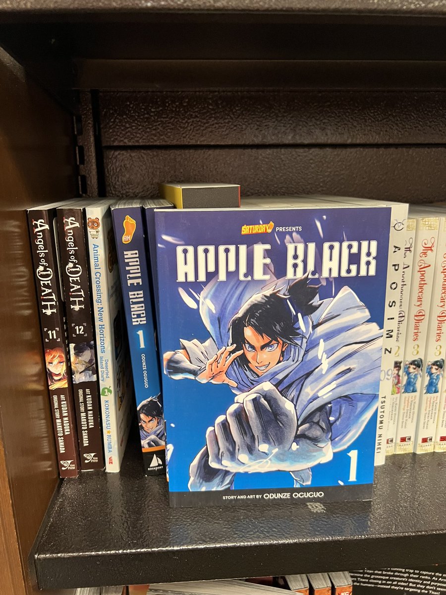 emratica's tweet photo. Got a signed copy of Apple Black from @WhytManga at #ALA22 & my kids loved it! Was so excited when I spotted it @BNBuzz that I recommended it to 3 other just people hanging out in the Manga section. 😂 Excited to put this in my school library for students to enjoy! @Saturday_am https://t.co/AZWQpMKJk7