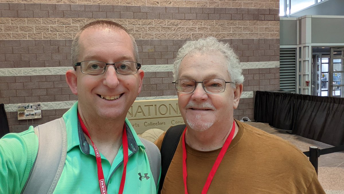 JamieEichenlaub's tweet photo. Couple of first-time attendees at the National Sports Collectors Convention. Found a cool backdrop for this pic on the way out. Day 1 in the books, can't wait for round 2 tomorrow.

#NSCC22 

#NSCC22 https://t.co/Pz1Zi6s9AR