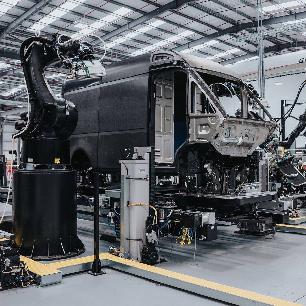 arrival's tweet image. A peek into the Arrival Microfactory. 
Fully automated tech cells and autonomous mobile robots assemble our EV’s using in-house developed software. 

It's the future, and it's just around the corner.