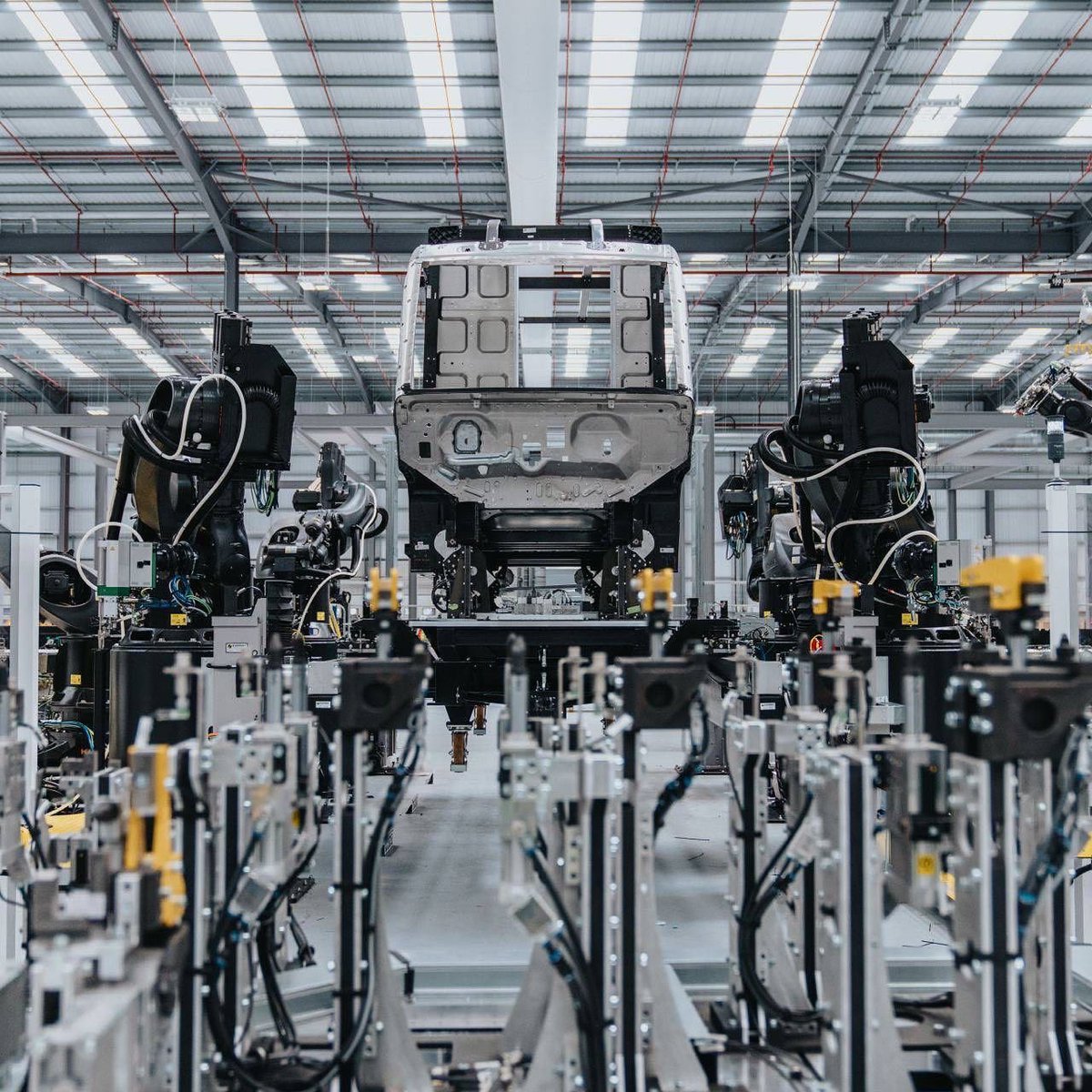 A peek into the Arrival Microfactory. 
Fully automated tech cells and autonomous mobile robots assemble our EV’s using in-house developed software. 

It's the future, and it's just around the corner.