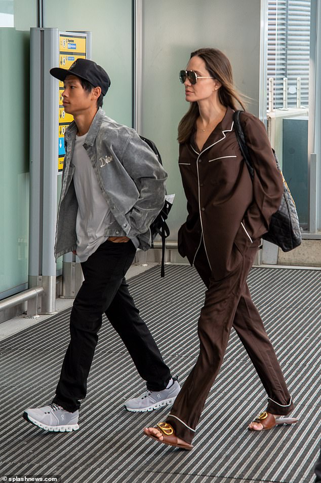 Angelina Jolie and Son Pax at Heathrow Airport: Photos