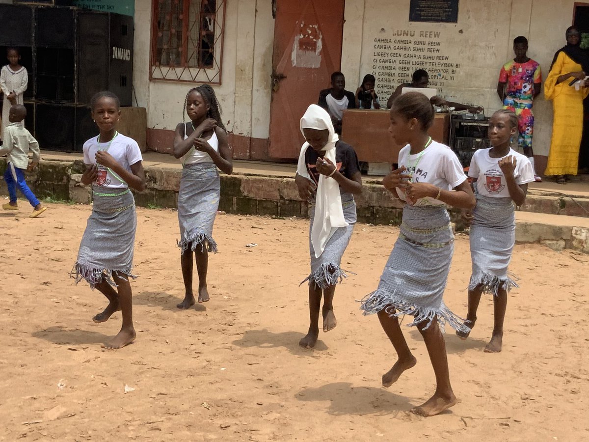 BrusubiRotary's tweet photo. Speech Day at Brikama LBS. President Alpha Omar Jallow @BrusubiRotary addresses pupils teachers and guests and handover prize items donated by @MRCHolland Foundation. Pupils also entrained the guests with Poetry and Cultural performances. https://t.co/5SKaFpOCCD