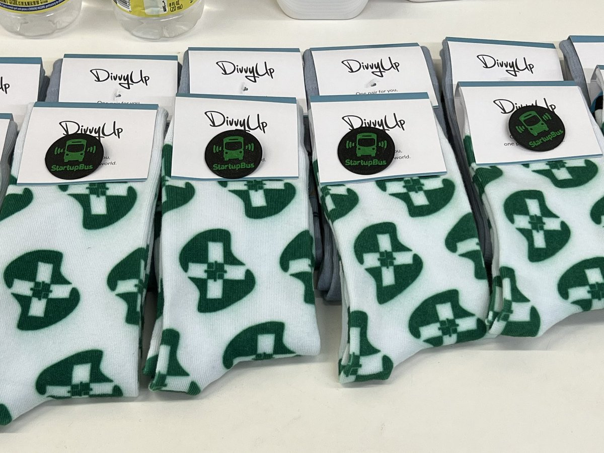 StartupBusFL's tweet image. What a technologically interesting time we live in! In a span of hours, Domi Station 3-D printed #StartupBus pogs and socks with one of our startup’s logos! #StartUpBus2022 #ThinkInsideTheBus
