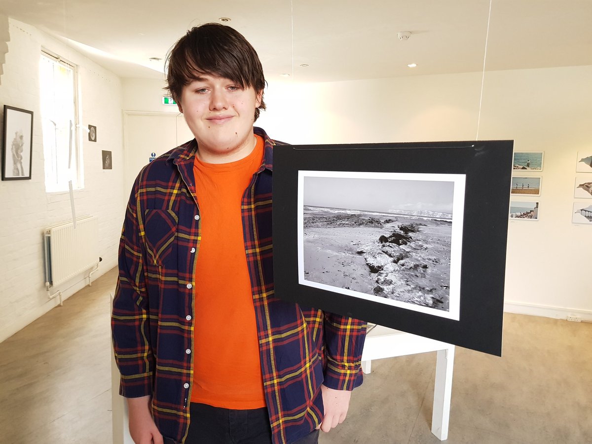 normstanfletch's tweet photo. So proud of my son. Having dealing with autism and social anxiety, he has found a niche in photography and studying his level 3 diploma at college. He's had two of his photos displayed at local arts centre. He was really proud to show them off to is today. #Autism #prouddad https://t.co/qryD10841h