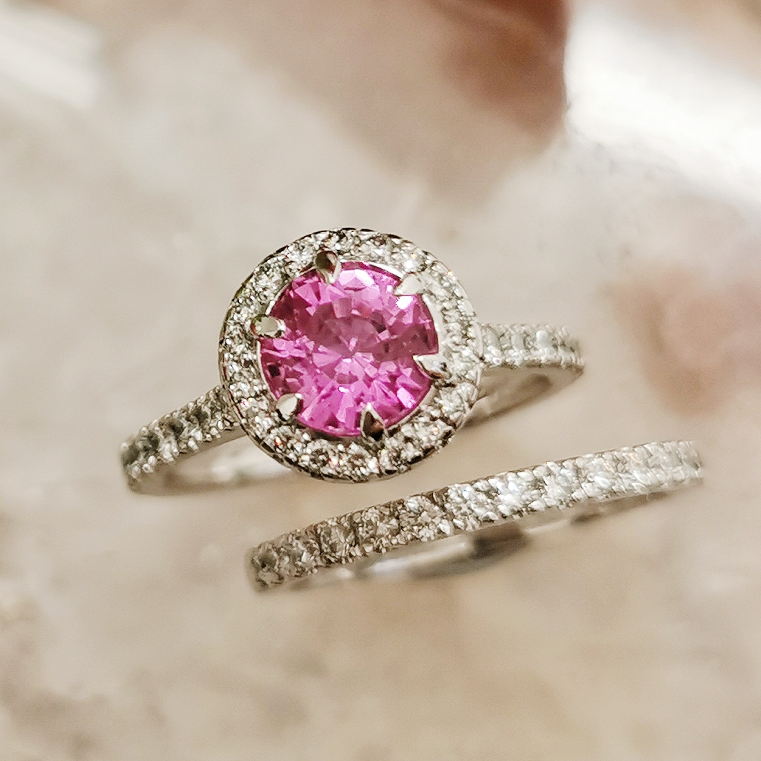 BillHicksDesign's tweet image. This bright and beautiful pink Sapphire and diamond halo is simply stunning.  
If you are looking for a coloured stone engagement ring then get in touch with our expert gemmologists today, and we will help you find the perfect gem for your dream ring.