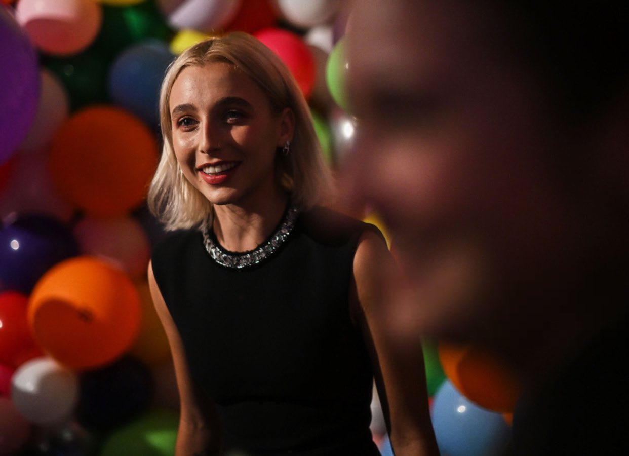 Emma Chamberlain arrives at Louis Vuitton's 200 Trunks, 200