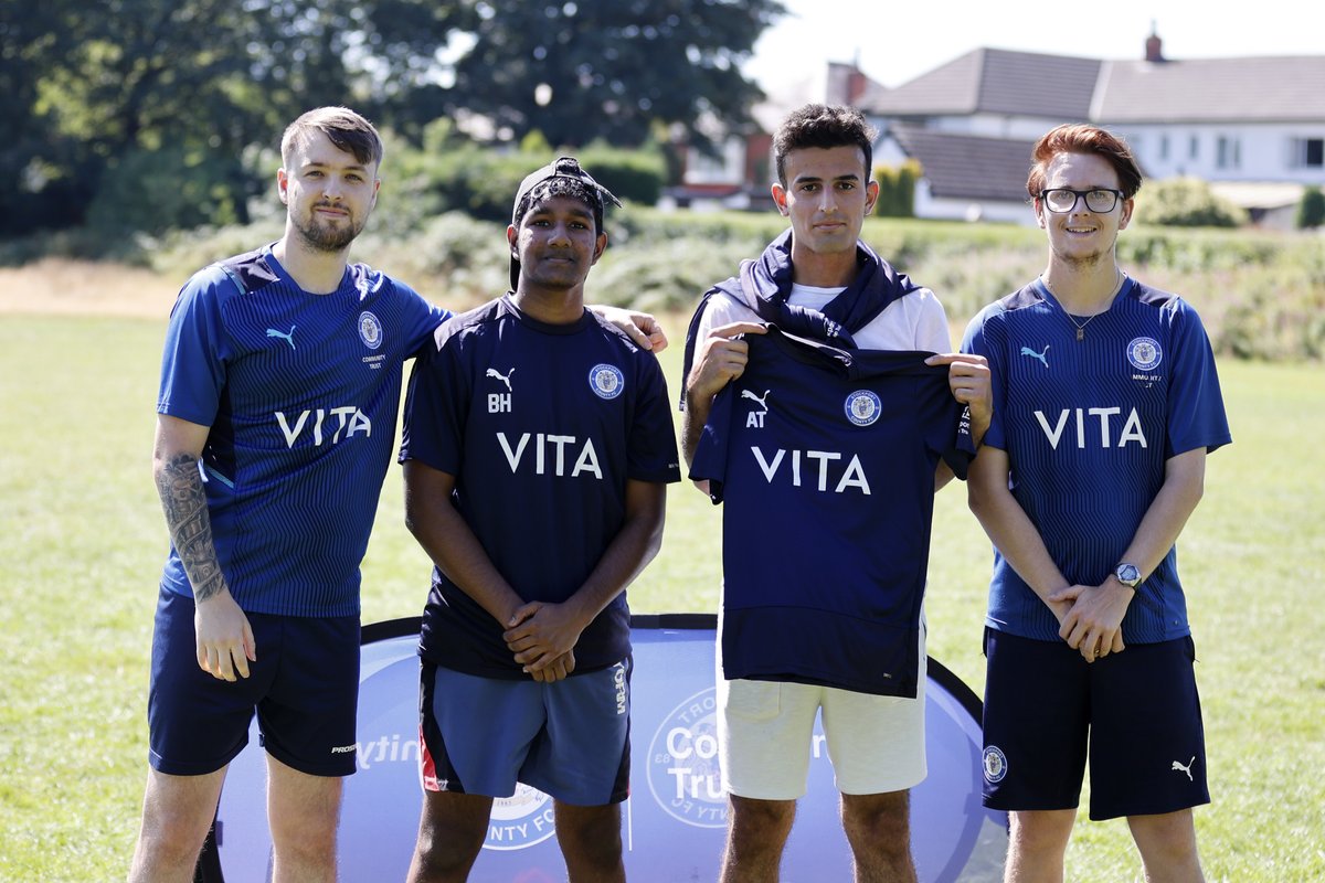 StockportCounty's tweet photo. Our @SCFCCommunity team are providing weekly football sessions for asylum seekers in Stockport. 

The sessions aim to improve mental health whilst providing fun for all participants! They donated some training kit for the players today, along with bringing the Trophy along! ⚽️ https://t.co/GFyeVyglQi