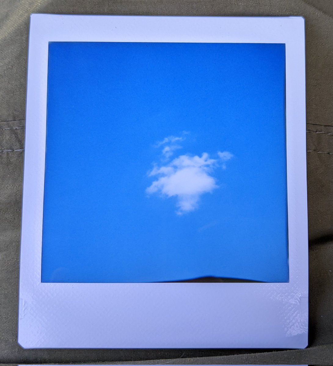 richardhall's tweet photo. A sign of hope 
#InstantRegret, day 12. This summer, even a glimpse of a wisp of cloud is welcome.
@ShittyChallenge #LomoInstantSquare  #instax https://t.co/6QXpHLxPbw