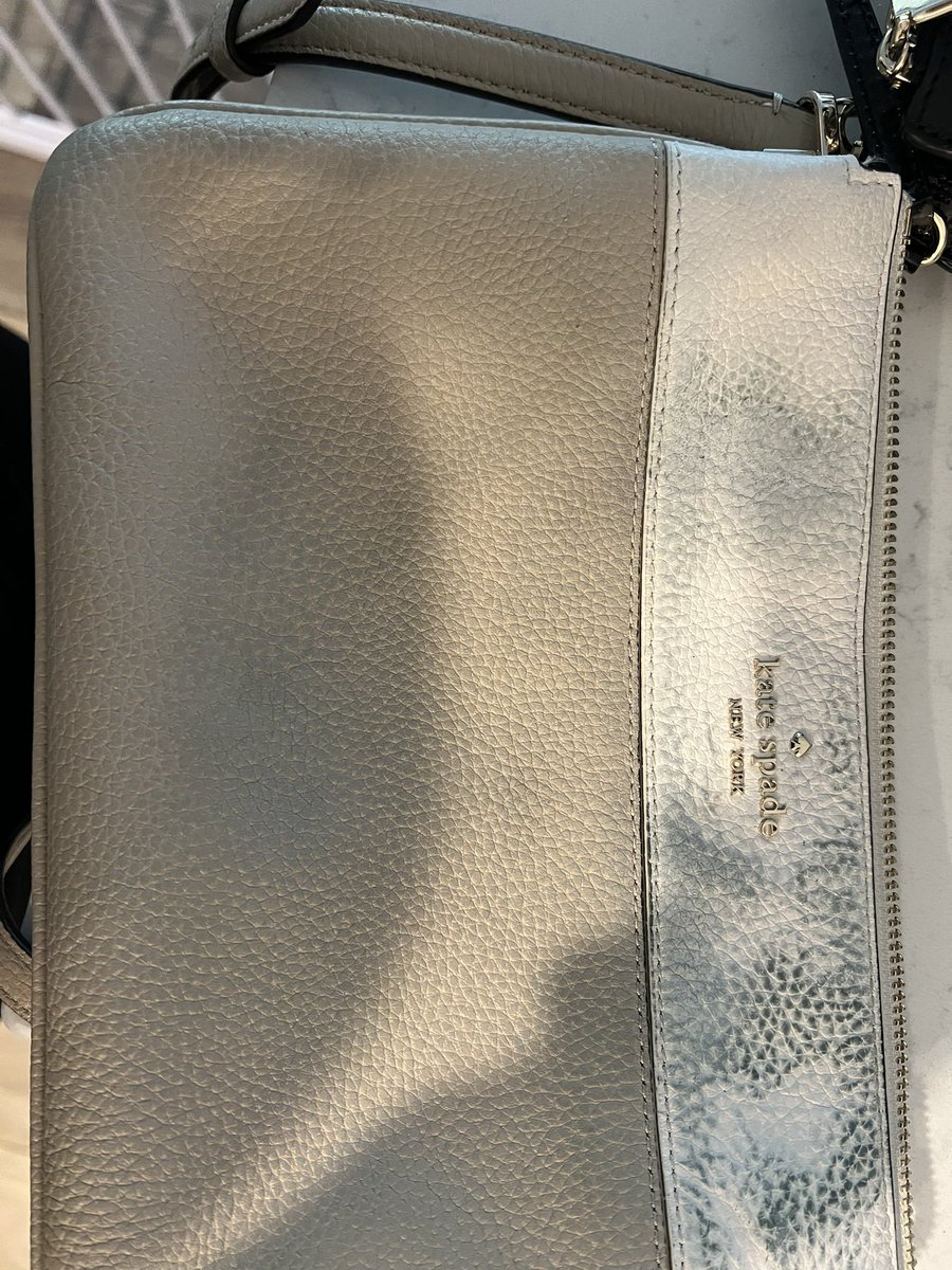 JB0002's tweet photo. @katespadeny purchased a bag less than two weeks ago- wore it with a plain black t-shirt and now the bag is ruined.   Customer service was absolutely unhelpful.  Second Kate spade bag this has happened too.   What options do I have? https://t.co/Pj3lHAAF0j