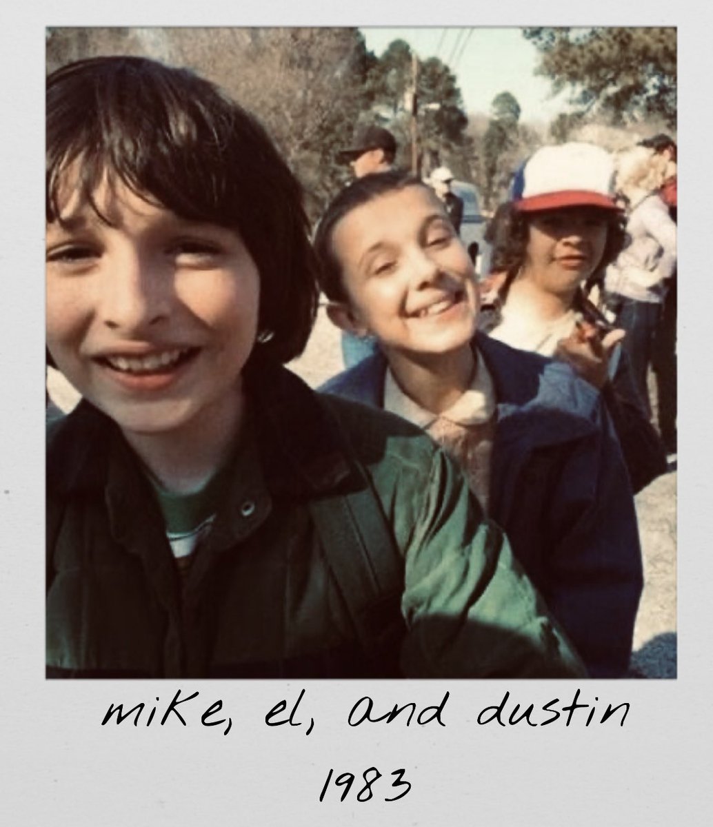 strngerpolaroid's tweet image. a polaroid of mike, el, and dustin 
1983