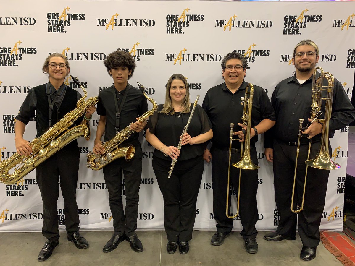 Travis alumni representing at the McAllen ISD general assembly.