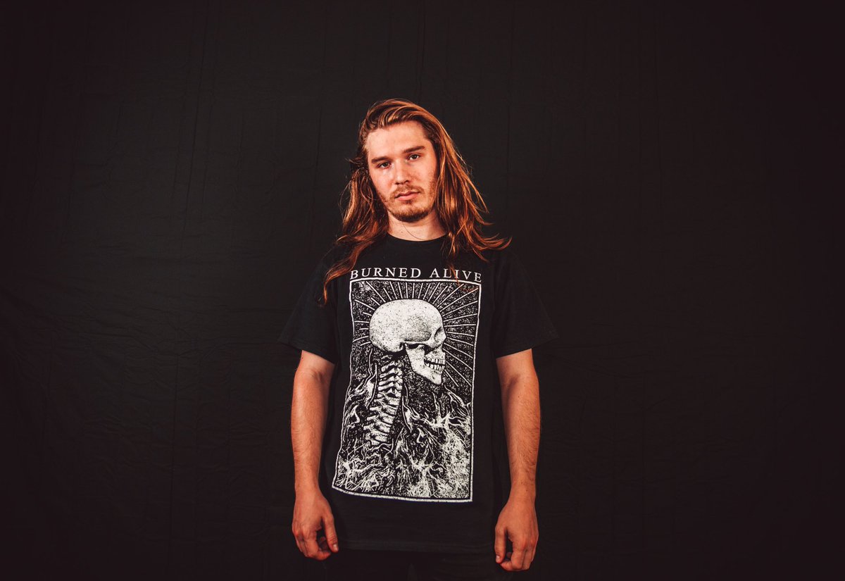 BurnedAliveCo's tweet photo. 𝐅𝐋𝐀𝐌𝐈𝐍𝐆 𝐒𝐊𝐔𝐋𝐋 𝐓𝐄𝐄 🔥☠️
Pre-Release Available Exclusively on 8/12 at @burythedarkness show
#LiveFromHell
📸: @jbh_visuals13 https://t.co/3veW95GXF4