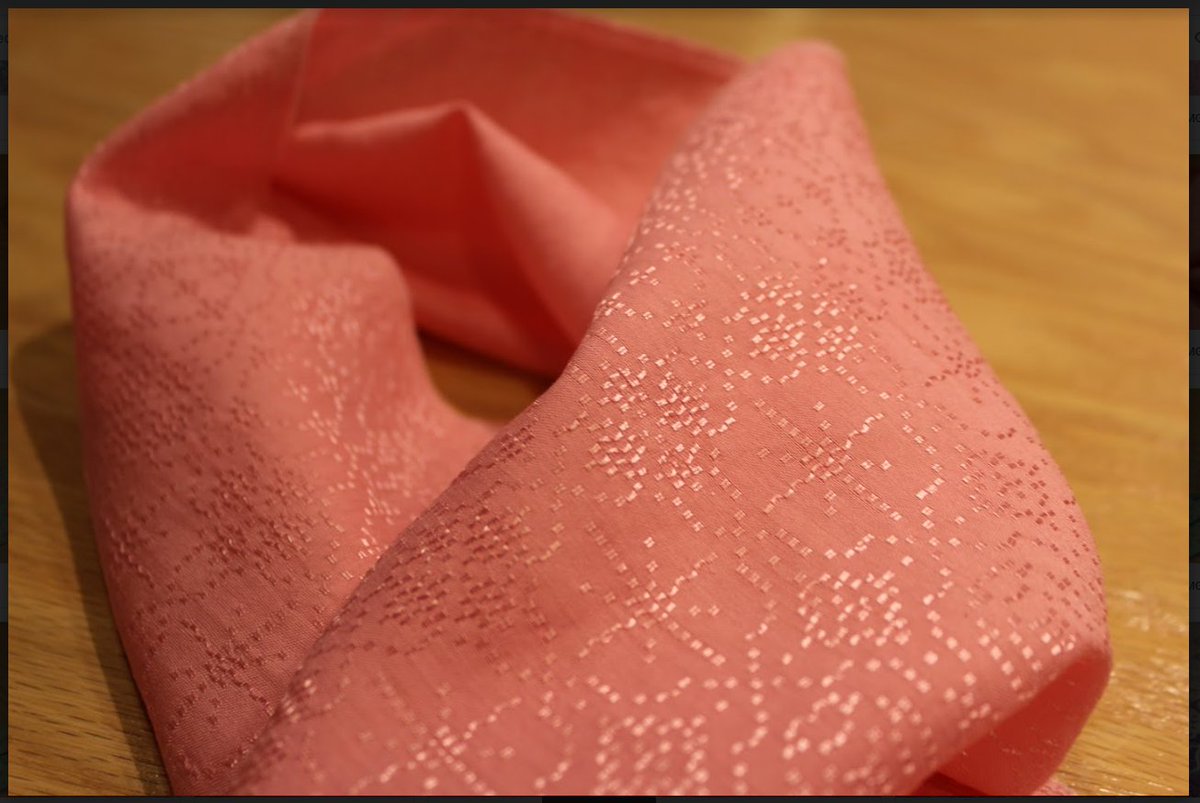 A beautifully textured scarf can transform an outfit from boring to elegant sophistication.  The textiles carried by Batax and luxurious are unique, like this exquisite coral scarf. #womenownedbusiness #shoplocal #supportsmallbusiness #luxury #fashion #dmvfashion #accessories