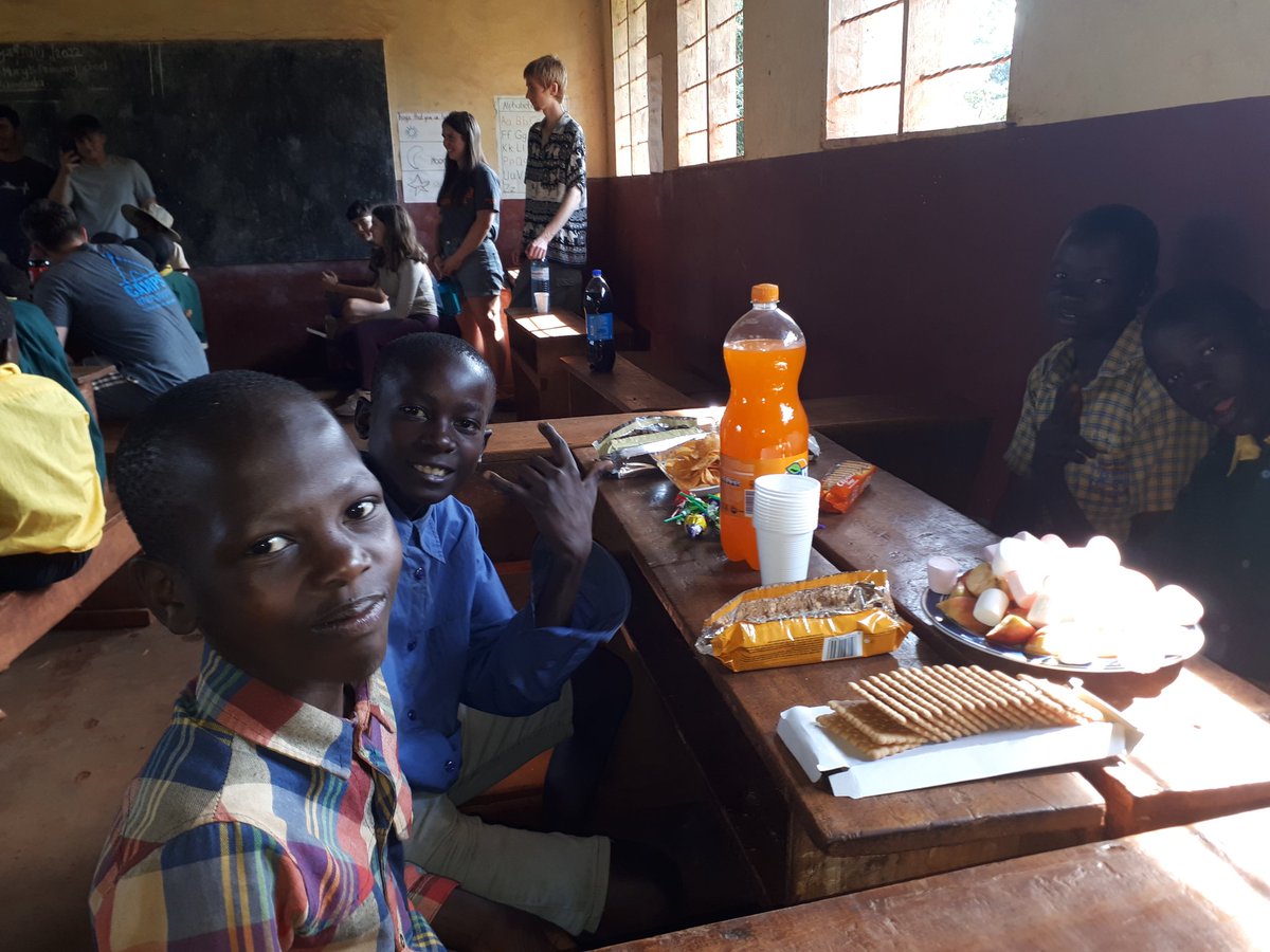 HartUganda2022's tweet photo. What to do on your last morning in Uganda - easy! Yesterday the team went to a downtown supermarket and loaded up on coca cola, Fanta, snacks, crisps, lolly pop's and goodies. This morning the kids had an end of term picnic they will never forget, a gentle happy day. https://t.co/vbx0yrdvLR