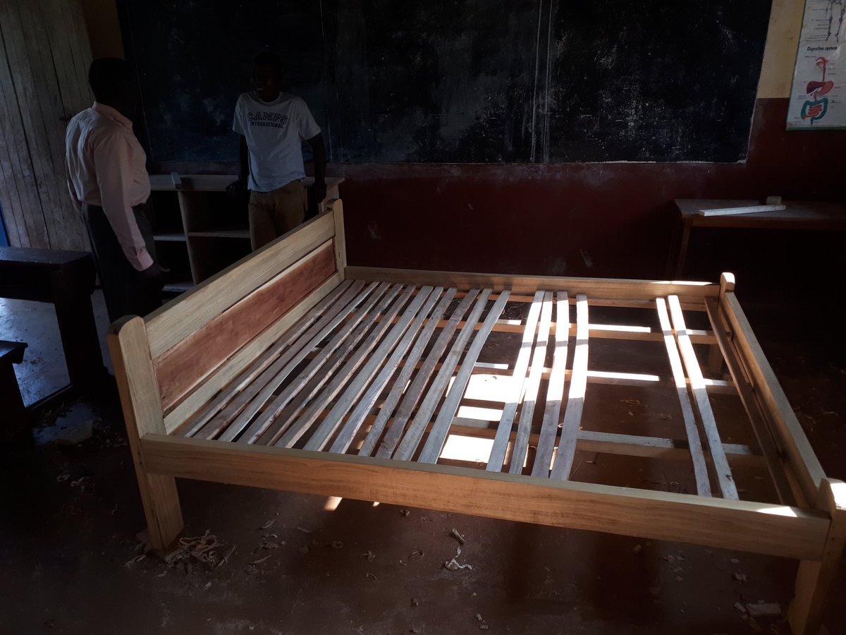HartUganda2022's tweet photo. Head teacher Moses, teaches the boys carpentry. He produces beds and sofas in one of the class rooms and sells them to fund building materials for his school. https://t.co/pGfjcU4HER