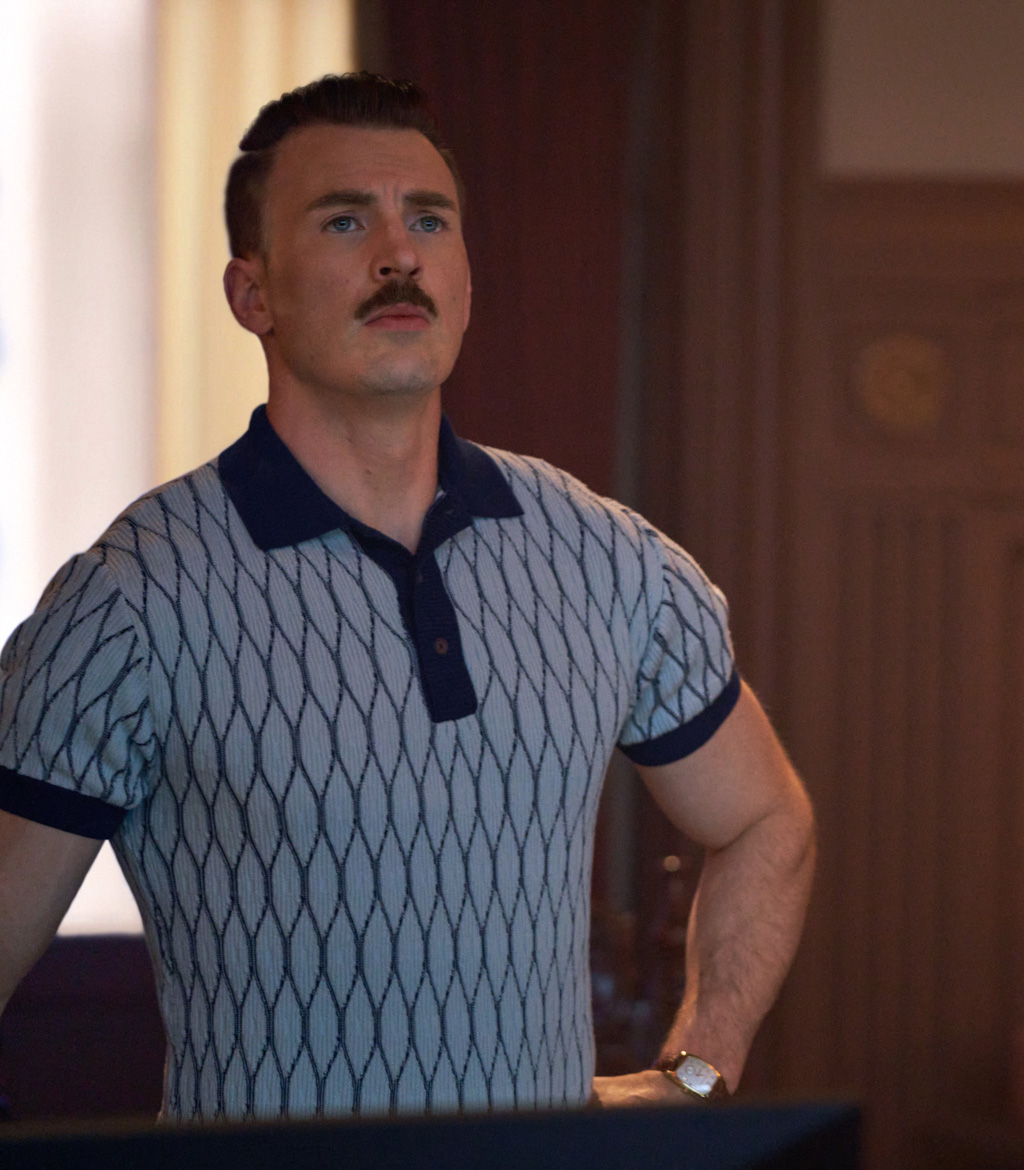 netflix's tweet photo. I would like to thank whomever it was in The Gray Man wardrobe department that accidentally shrunk one of Lloyd’s shirts because it now fits Dodger just as well as it fits Chris Evans! https://t.co/WXlG73EesB