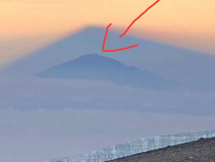 We reached the summit of Kilimanjaro this morning (5,895m). You can see the triangle of shadow made by Kili - but can you make out the mountain in the shadow? That’s Meru, the peak I climbed just two weeks ago. Pretty cool huh? 

@earthsedge
#kilimanjaro #makeadventureshappen