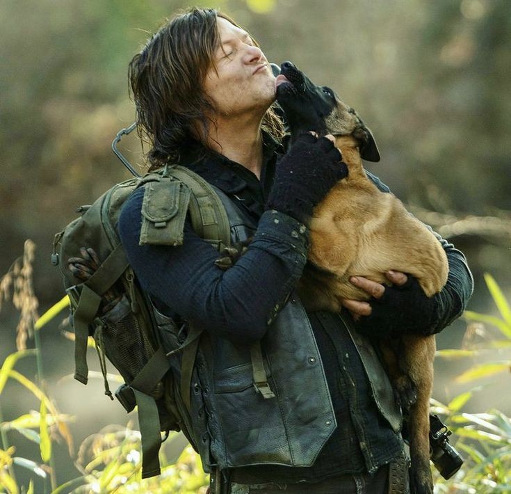 Norman Reedus as Daryl Dixon with Dog