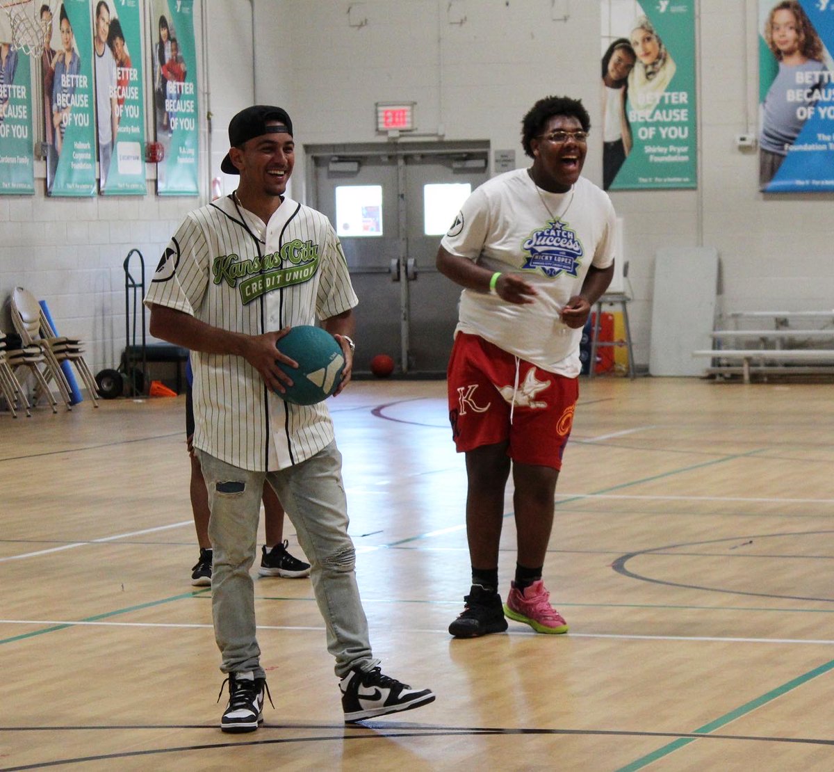 KansasCityYMCA's tweet photo. Today, we celebrated the first graduating class of the Catch Success program with @Royals Nicky Lopez and @KCCreditUnion! Lopez presented a $10,000 check to the YMCA to continue Catch Success, which teaches youth financial literacy and professionalism skills. https://t.co/iuuxN7sjjz