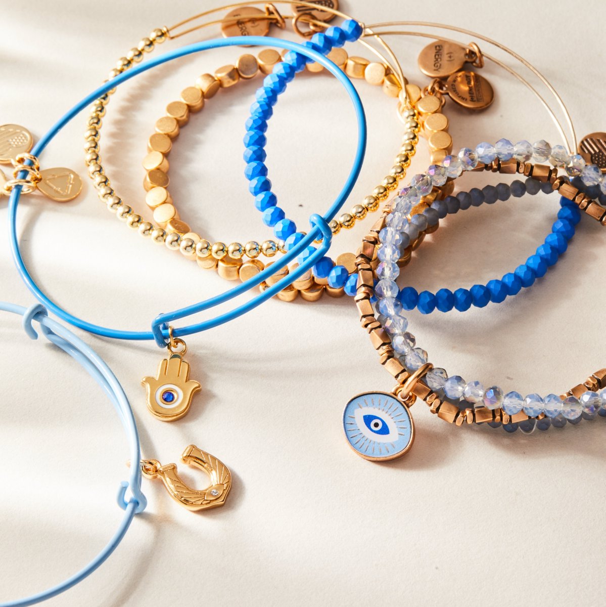 alexandani's tweet image. Instantly adds to cart... 😉 
Shop now &amp;gt; cur.lt/pykgkiuto

#alexandani #stackoftheday #newarrivals #meaningfuljewelry #everdayjewelry #evileye #braceletstack #bluejewelry
