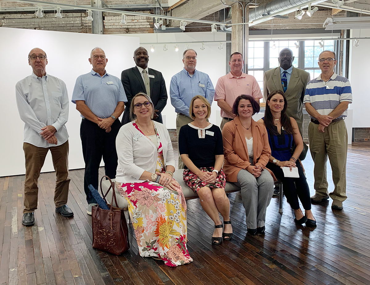 WKCTC's tweet photo. The WKCTC Board of Directors took part in a retreat on  campus today visiting two facilities—the Challenger Learning Center, and the Paducah School of Art &amp; Design— and heard WKCTC President Anton Reece explain the college's "Reflect > Re-envision > Results: A Holistic Review​." https://t.co/CKpVRqtkYt