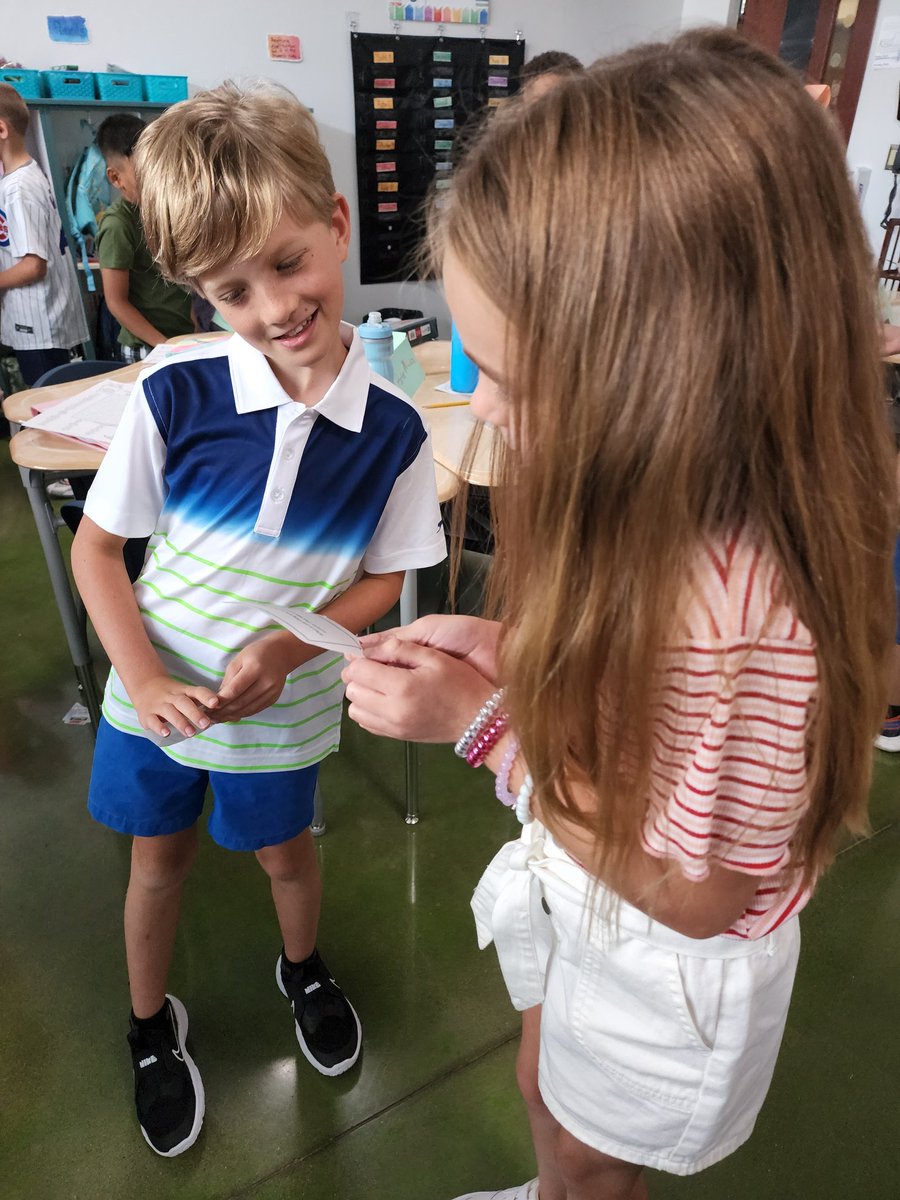 It was a great day being back in the classroom and getting to know everyone!

The kids did an activity called "Quiz-Quiz-Trade" today with questions to get to know each other better. It was great seeing them relax and start forming friendships.