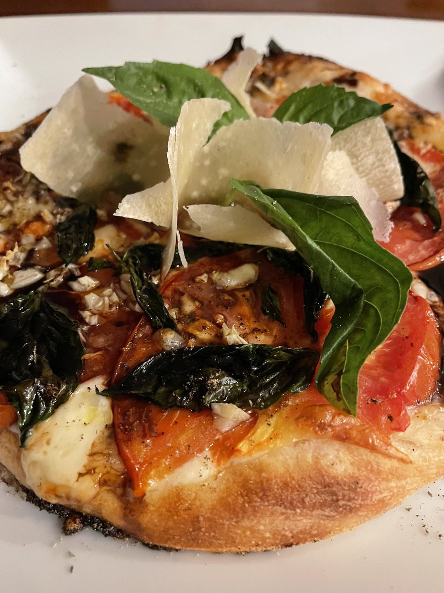 Homemade brick oven Neapolitan Margherita Pizza drizzled with Balsamic reduction #recipeoftheday #foodblog #italianfood #wednesday #dinner