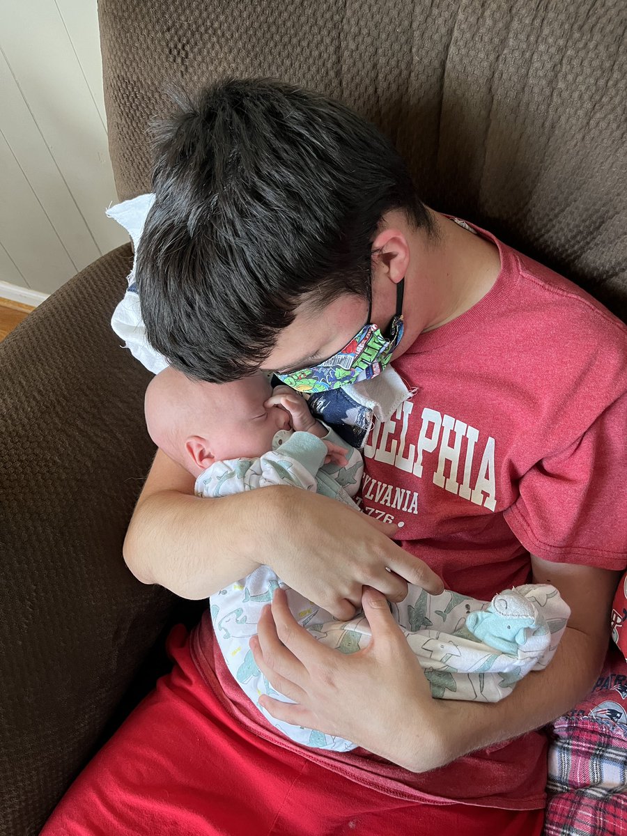 This Fin Friend FINALLY got to hold his nephew! What a great uncle he is!