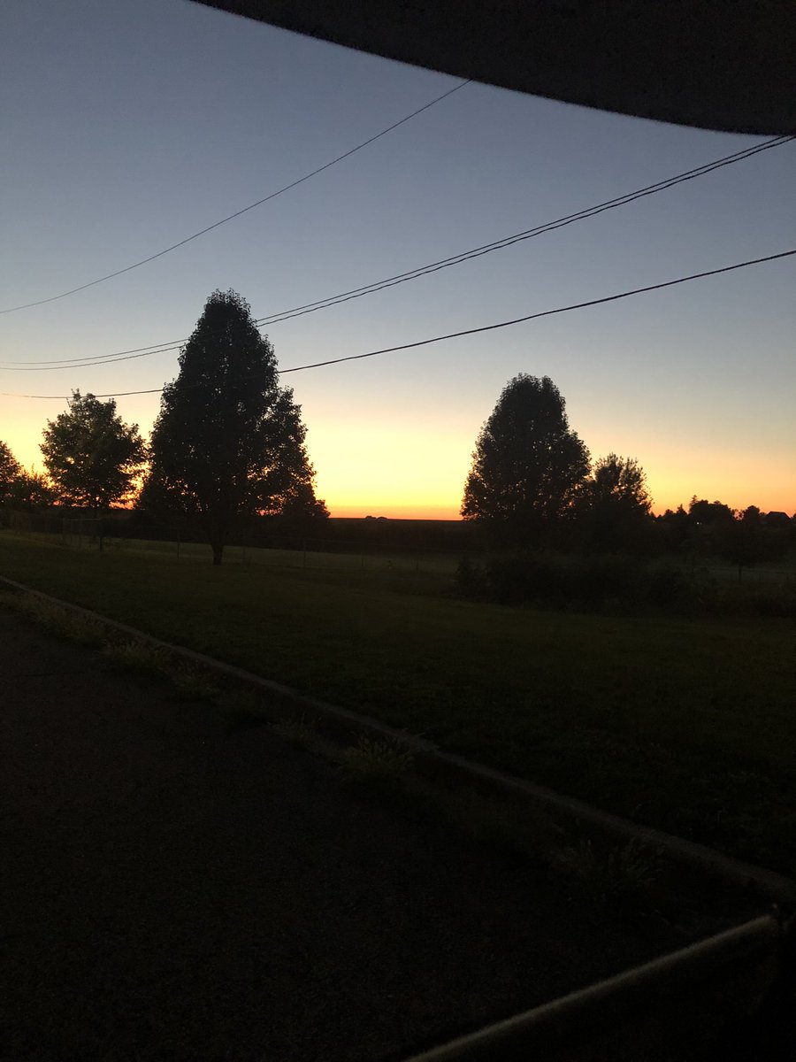 AnthonyTMcCoy's tweet photo. A golden sunset and a bright full moon greet me at the end of a long day. A special thanks to @marcy_brugger and @elmwood322tech who are still at school getting ready for our students! #trojanforce322 https://t.co/x5yAqhibEg
