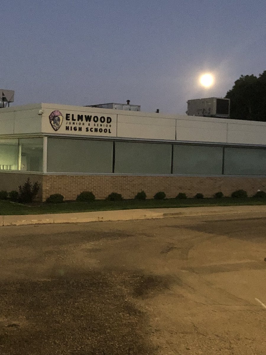 A golden sunset and a bright full moon greet me at the end of a long day. A special thanks to <a href="/marcy_brugger/">Marcy Brugger</a> and @elmwood322tech who are still at school getting ready for our students! #trojanforce322
