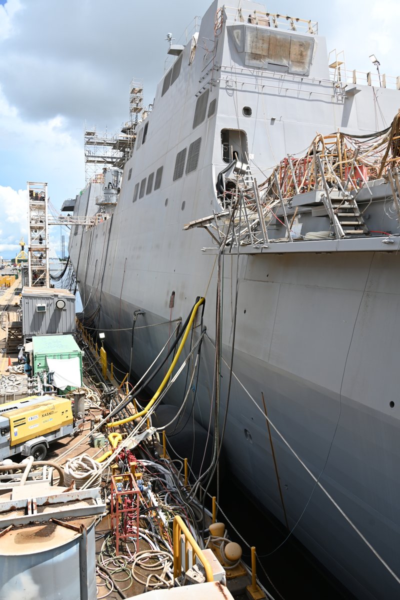 CavasShips's tweet photo. RICHARD M #McCOOL JR LPD29 fitting out at @WeAreHII Ingalls Shipbuilding on 4 Aug. The Flight I+ San Antonio-class amphibious ship was launched in Jan, with delivery sked for 4th quarter of FY23. Bow of destroyer JACK H LUCAS DDG125 is seen thru the well deck in last shot https://t.co/Z3xTiBpQ7s