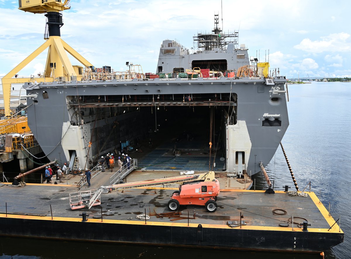 CavasShips's tweet photo. RICHARD M #McCOOL JR LPD29 fitting out at @WeAreHII Ingalls Shipbuilding on 4 Aug. The Flight I+ San Antonio-class amphibious ship was launched in Jan, with delivery sked for 4th quarter of FY23. Bow of destroyer JACK H LUCAS DDG125 is seen thru the well deck in last shot https://t.co/Z3xTiBpQ7s