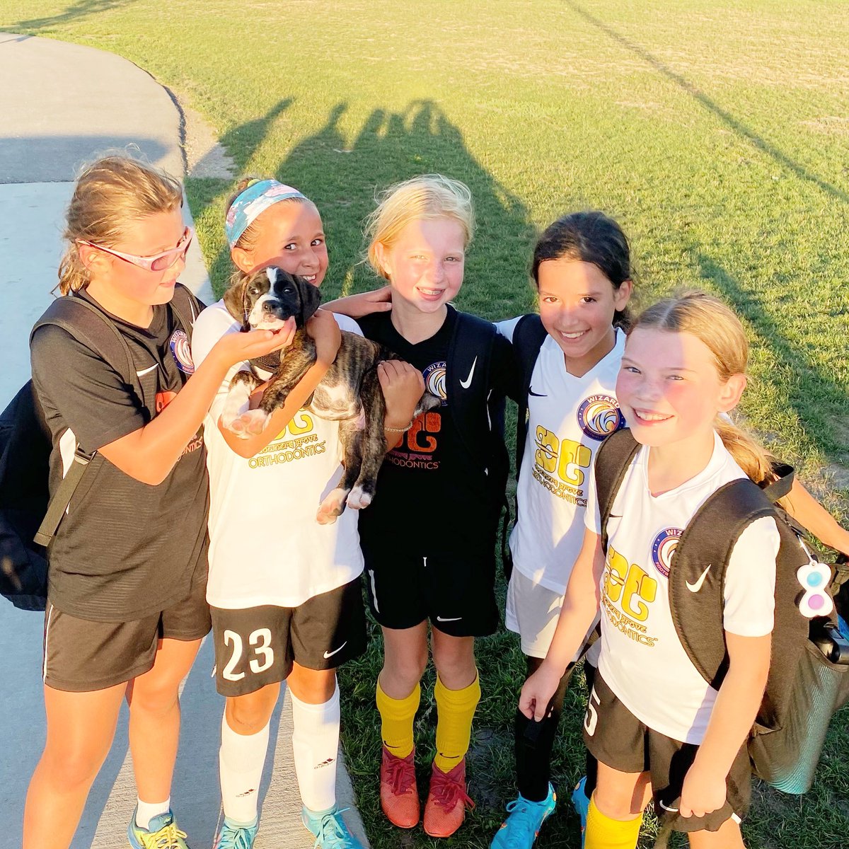 WizardFCSoccer's tweet photo. What’s the BEST way to close out summer training? Obviously, with some puppy snuggles!! Meet Duke—the new mascot for the 2012 Girls Academy Team! https://t.co/anFrXB6OLD