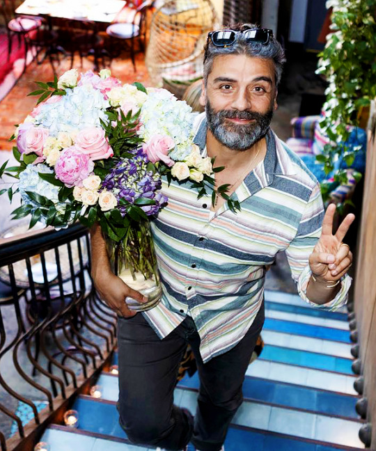 OSCAR ISAAC SAID HE WOULD BUY THE FLOWERS HIMSELF