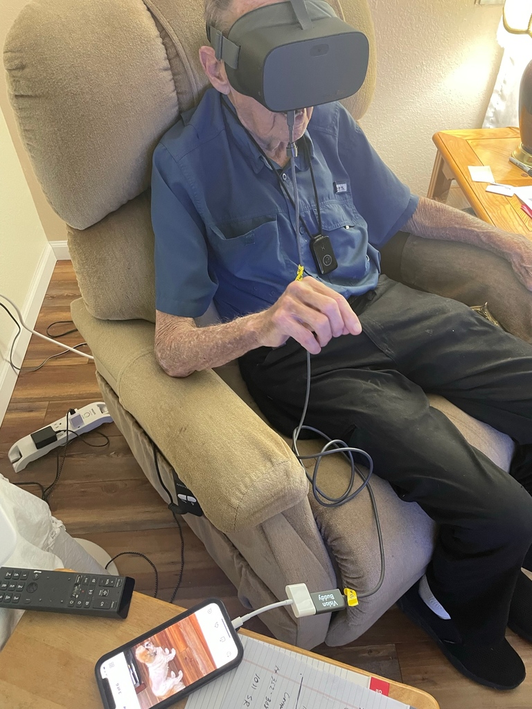 FLVISION's tweet photo. Raymond, wanted to look at pictures of his dog on his iphone that his daughter sent him via text, with the Vision Buddy, we connected it to his iphone, and he is able to get a  up close and clear image of the cute doggo. https://t.co/UboXCcjweO