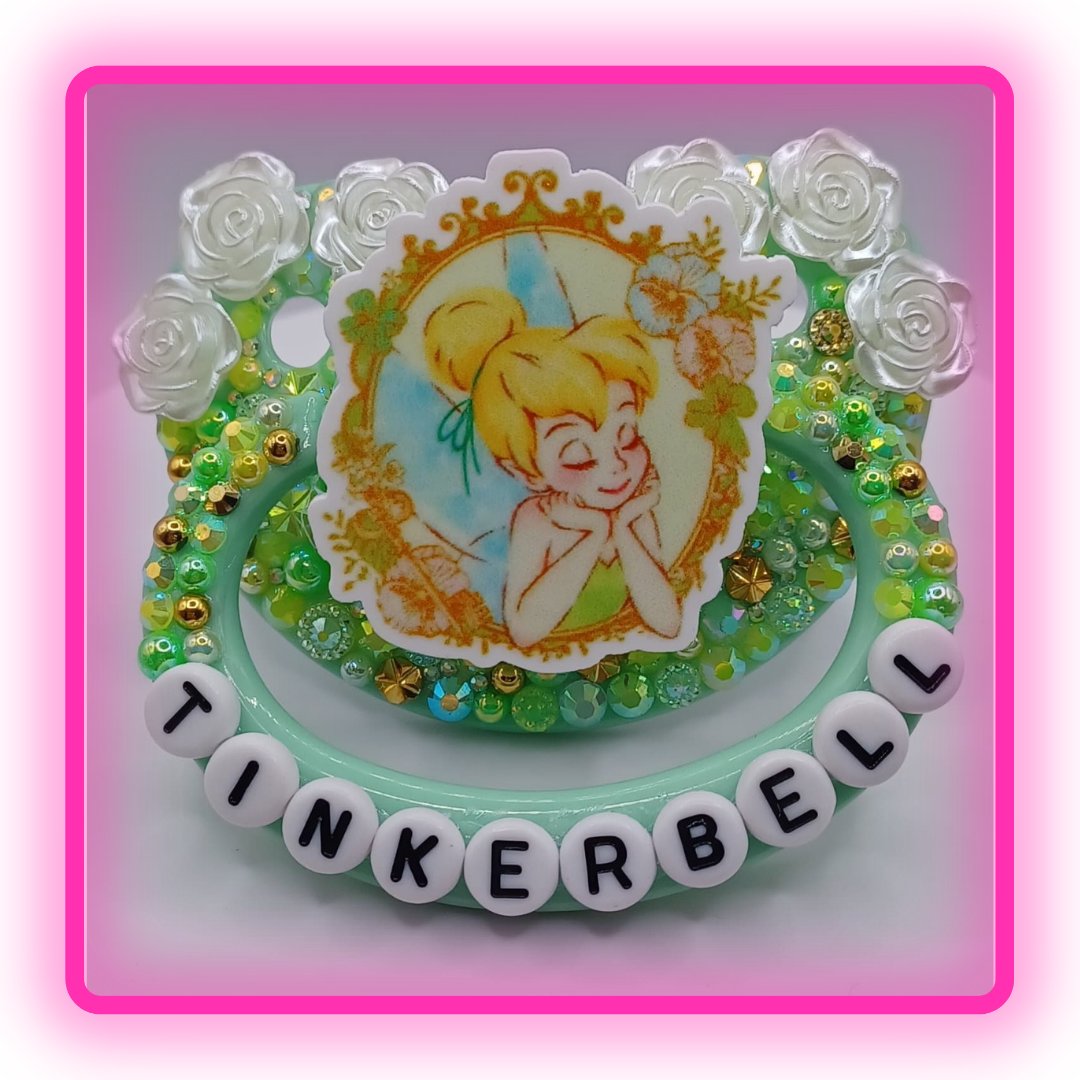 LittleShop89's tweet photo. This beautiful Pacifier has a green, yellow, and gold rhinestone and pearl mix with white roses and Tinkerbell on the handle.

Disclaimer: This product is intended for individuals that are 18 and older. This is an adult comfort item.

#adultpacifer #adultpacifiershop #decopaci https://t.co/tJdxmC5wyB