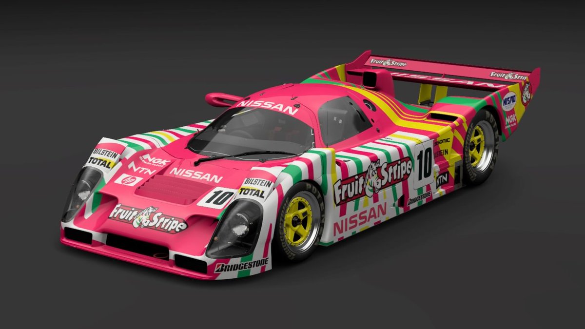 chrissiegle's tweet photo. The last of the wedge-shaped GR1 cars from the late 80s/early 90s. My Nissan R92CP, sponsored by Fruit Stripe gum. #GranTurismo7 #GT7Livery #LiveryEditor https://t.co/2EmqW9WMBK