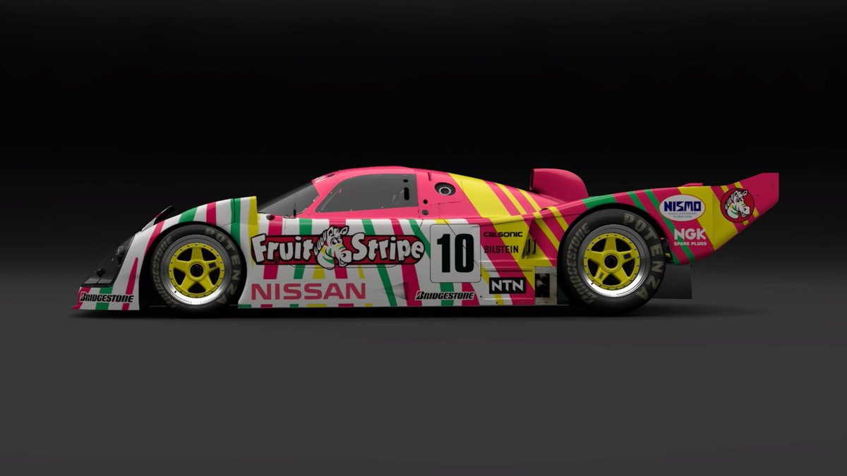chrissiegle's tweet photo. The last of the wedge-shaped GR1 cars from the late 80s/early 90s. My Nissan R92CP, sponsored by Fruit Stripe gum. #GranTurismo7 #GT7Livery #LiveryEditor https://t.co/2EmqW9WMBK