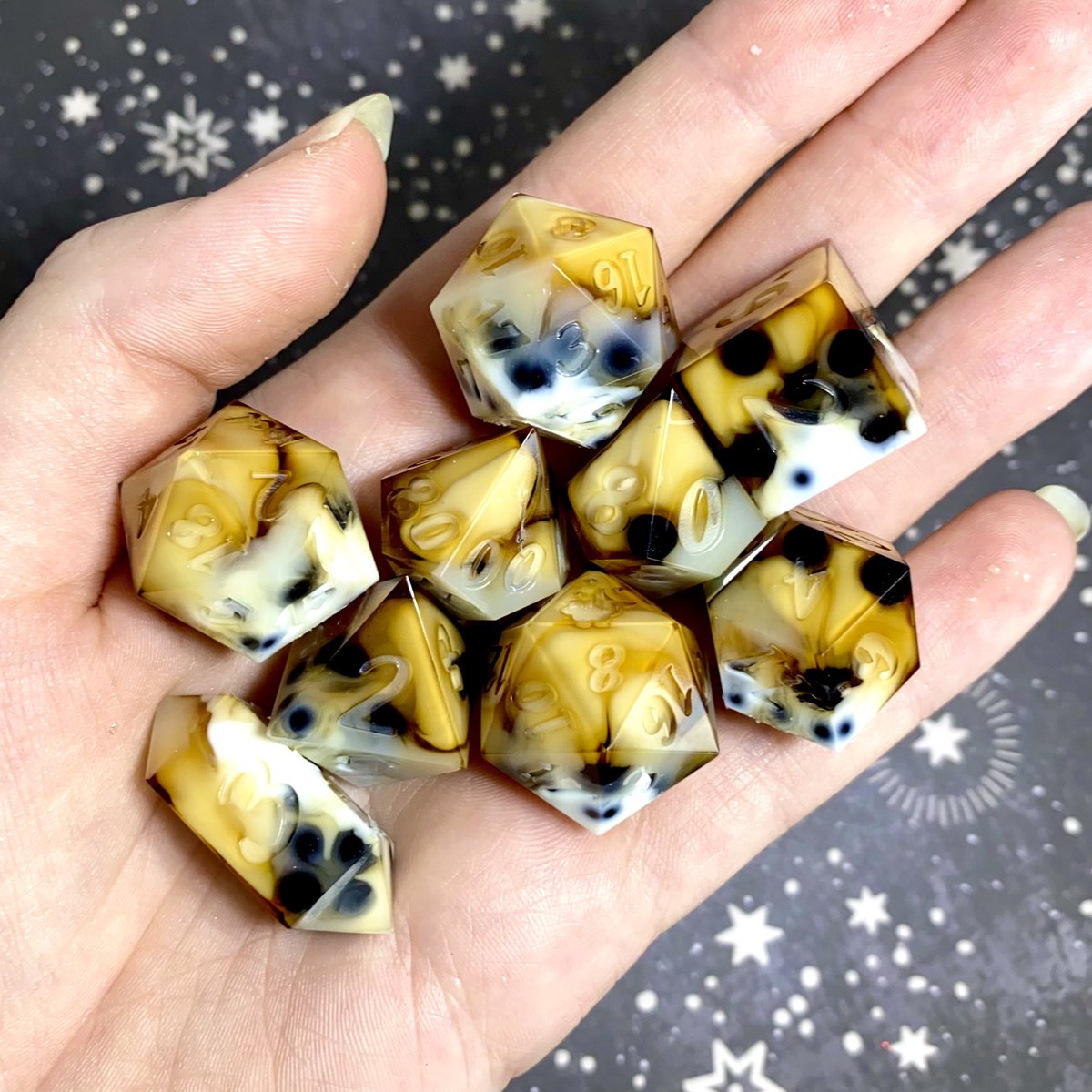 Dreamy_Dice's tweet photo. First attempt at boba dice yesterday and learned the important lesson that what I’m using for the boba pearls will indeed float 😅

I think they’re too cute to be a fail despite being inverted (the pearls should’ve stayed in the translucent syrup part), more tests soon! 🥰 https://t.co/Lg88bBzrZI