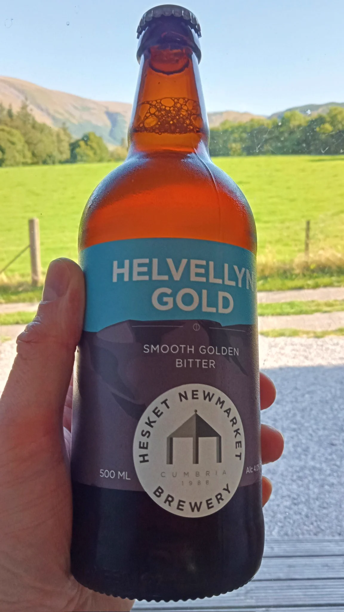 A bottle of Helvellyn Gold beer, from Cumbrian cooperative Hesket Newmarket brewery.
