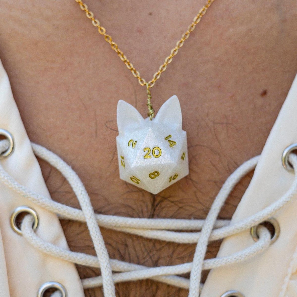 _GrinningKitten's tweet photo. The Leon iCATsahedron necklace.

Available during this month’s shop update!

#ttrpg #dnd #d20 #dice #dicemaker #handmadejewelry #dimension20 #cat https://t.co/rrL80FIAaT