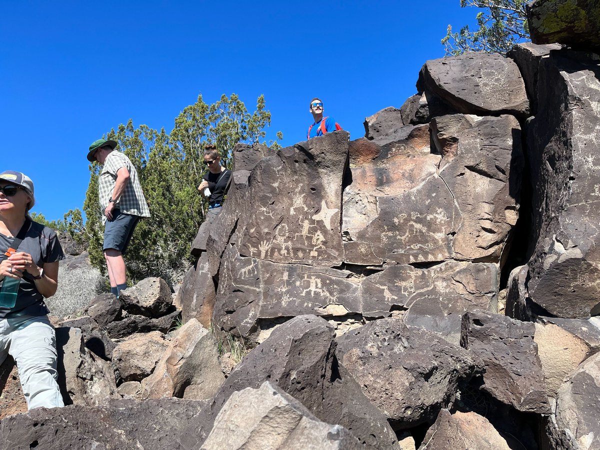 wradv's tweet photo. #ThrowbackThursday to when WRA held a team building retreat in Santa Fe, NM. Here are some of our colleagues at La Cieneguilla Petroglyphs. The petroglyphs date back to the pre-contact time and the Spanish Colonial era, that can be found along this mesa above the Santa Fe River. https://t.co/7pIsD91NwA