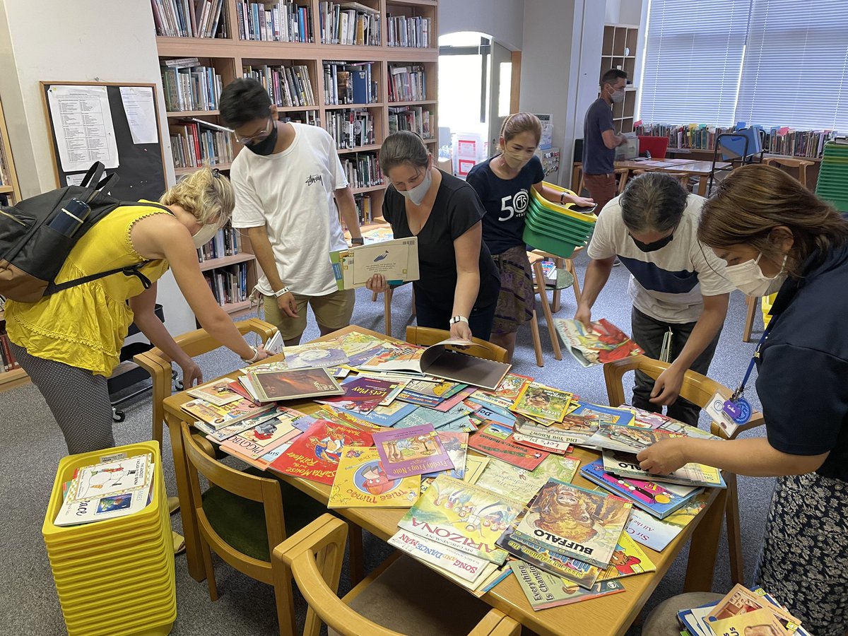 LibraryKirkL's tweet photo. So fun watching ES teachers “book shop” the hundreds of books I found just sitting in boxes unused. Hooray for putting books in the hands of our students! #FISlearns #FISreads #intlchat #read @FISSharks https://t.co/mW71pVsCVS