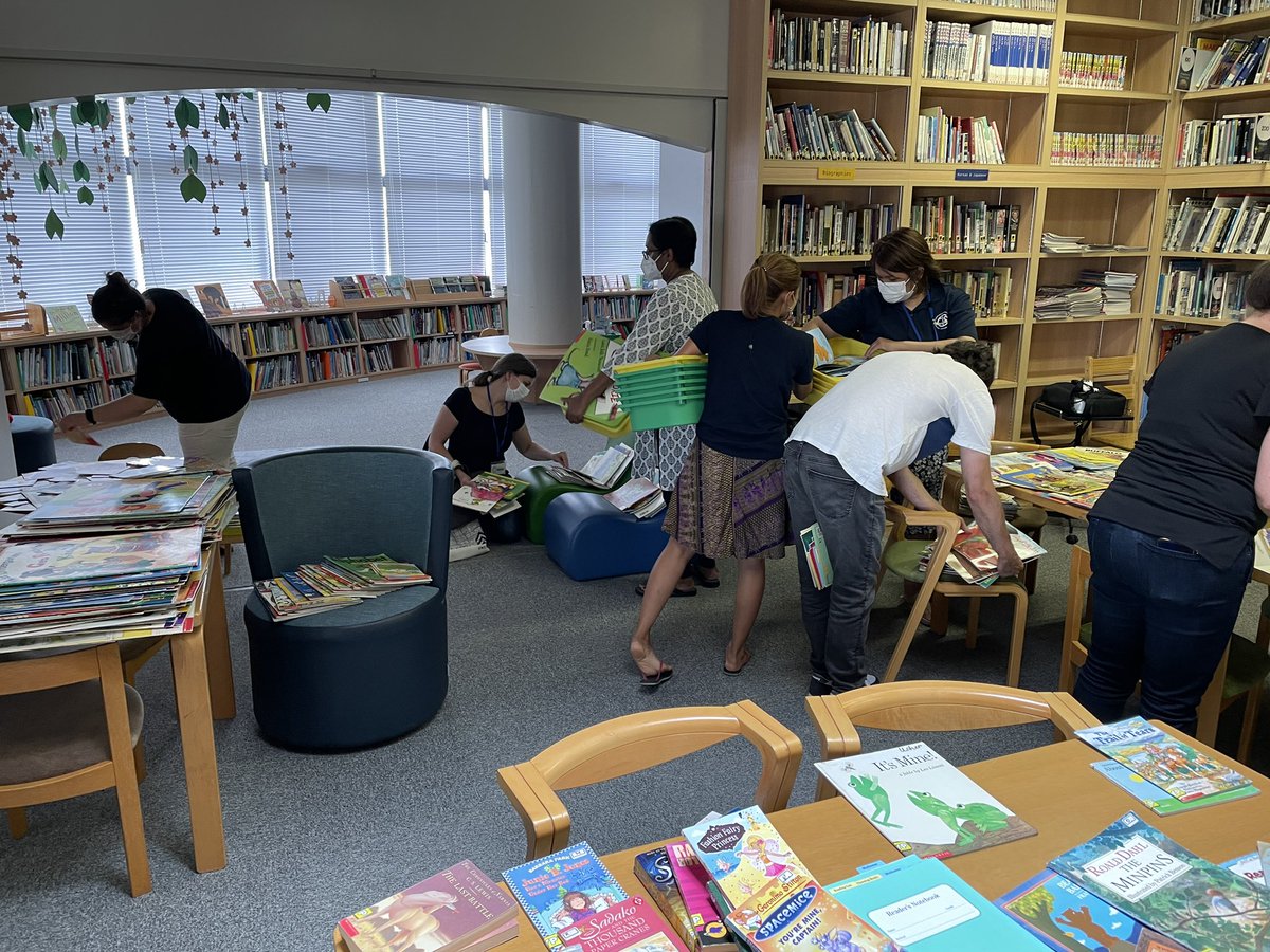 LibraryKirkL's tweet photo. So fun watching ES teachers “book shop” the hundreds of books I found just sitting in boxes unused. Hooray for putting books in the hands of our students! #FISlearns #FISreads #intlchat #read @FISSharks https://t.co/mW71pVsCVS