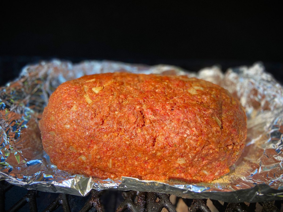 And onto the smoker it goes!!! 
First time doing smoked meatloaf! 😍😍 

#alwaysexperimenting #smokedmeatloaf #pitboss #pelletsmoker #chicksthatbbq