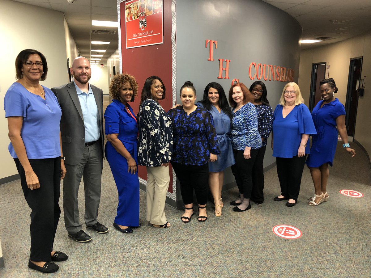 veronicamp8's tweet photo. Travis HS counseling department at the end of day 2. A sea of Blue to welcome our Tigers and a little humor  for comic relief @THS_Tigers  @TheTigerSuite https://t.co/2nQ8MxCW3q