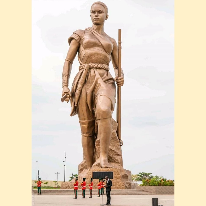 BuhbleBlack's tweet photo. Benin unveils 30m statue honouring the Agojie strike force - the women warriors of Dahomey. The only documented all female army in modern history. Unveiled in Cotonou, Benin it is the likeness of #QueenHangbe.

 #doramilaje #agojie #thewomanking #lupitanyongo #violadavis https://t.co/c3bvUiNjAI