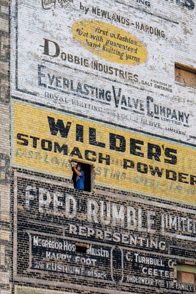 MikePrattPhotos's tweet image. I get sad when I see our already too few ghost signs getting hacked up or painted over completely. Frustrating. #Winnipeg
